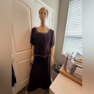 A purple chiffon ball gown with heavy beading
